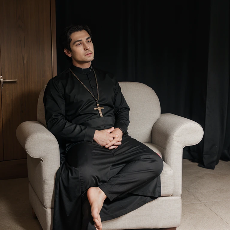 Male priest in a black long dress sits on chair