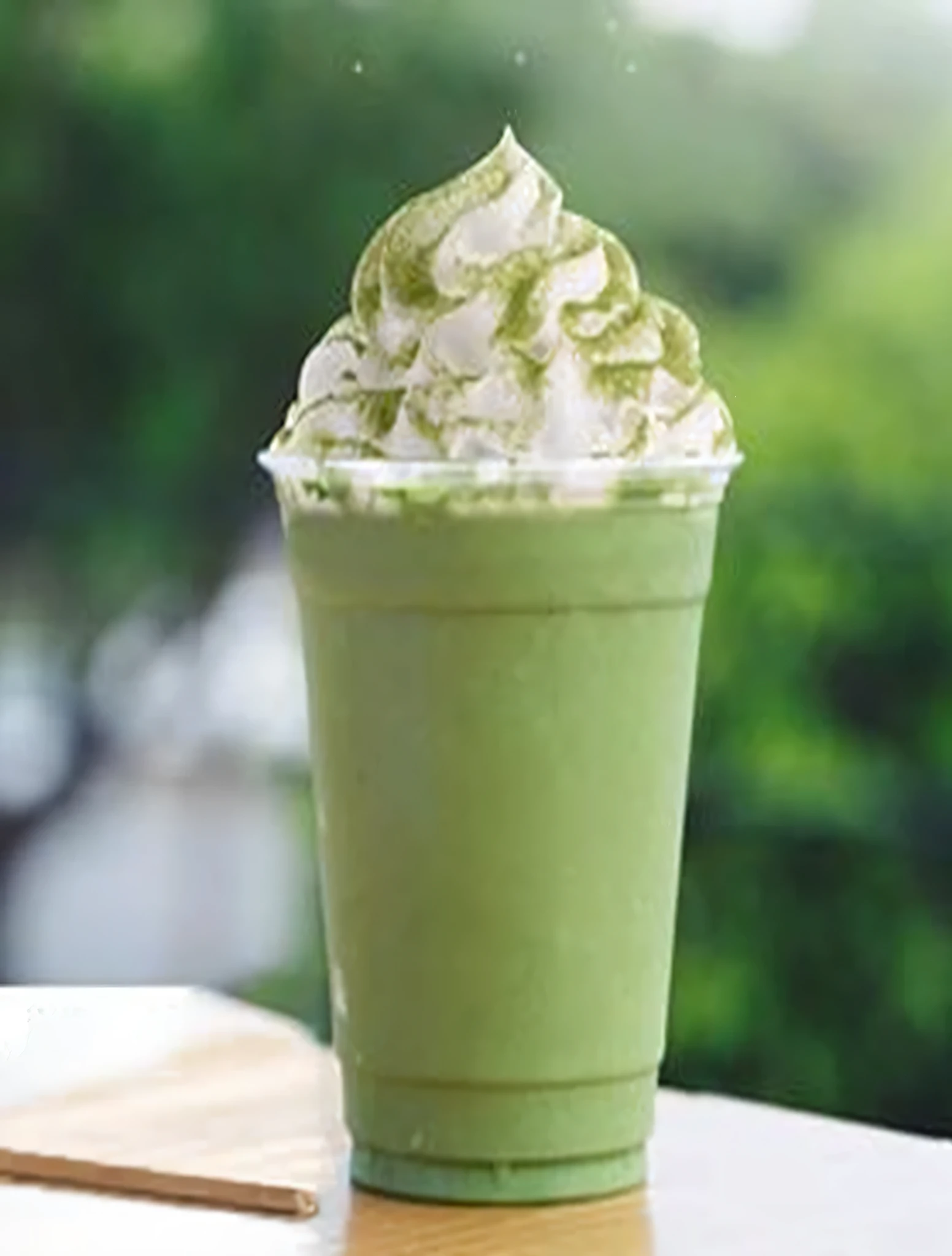 matcha cream cheese,illustration,soft creamy texture,delicious swirls,tempting chocolate drizzle,crumbs,satisfyingly rich flavor,(best quality,4k,highres,masterpiece:1.2),(realistic:1.37),(vivid colors:1.1),mouthwatering treat,artistic presentation,creative composition,subtle lighting,calming green color palette