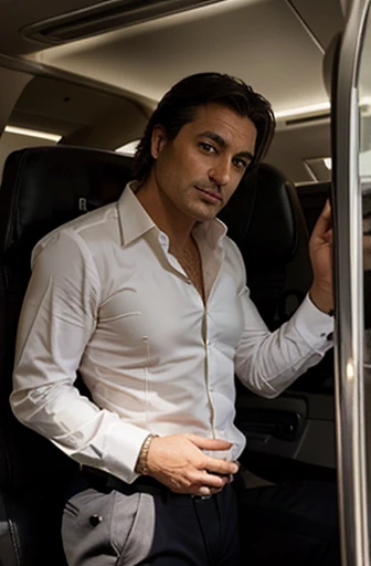 un sex-symbol italiano muy elegante que seduce mujeres, He is 45 years old and is a businessman posing next to an airplane