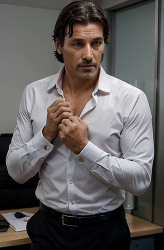 un hombre sex-symbol italiano muy elegante que seduce mujeres, He is 45 years old and is a businessman posing in the office