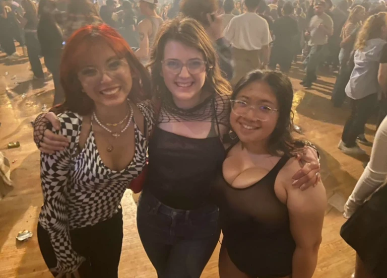 three women standing next to each other in a room full of people, non blurry, with tiny people, concert photo, not blurry, photo taken in 2 0 2 0, very grainy, very very low quality picture, profile pic, profile picture, very very low quality, by Bernie D’Andrea, photograph of three ravers, threesome, Big tits, huge tits, no clothes, sexy, cute, wide hips, thick thighs, pear-shaped body, minimal clothes, thick, bbw, chubby stomach, thick nipples, nipple piercings, large areola, hard nipples, piercing through shirt, nipples hard through shirt, chubby stomach showing, tummy spilling over the side, muffin top, the girls are sexy, short girls, only top of body, top zoom in, girl in middle behind