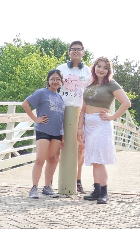 three people standing on a bridge with a woman standing next to them, standing on a bridge, on a bridge, taken in the early 2020s, vacation photo, waist high, standing near the beach, group photo, casual pose, environmental shot, on a sunny day, profile pic, photo taken in 2 0 2 0, 2 0 2 2 photo, threesome, Big tits, huge tits, no clothes, sexy, cute, wide hips, thick thighs, pear-shaped body, minimal clothes, thick, bbw, chubby stomach, thick nipples, nipple piercings, large areola, hard nipples, piercing through shirt, nipples hard through shirt, chubby stomach showing, tummy spilling over the side, muffin top, panties only, no pants, pants off, stomach too big for panties, small crop top shirt, major cleavage, nipples showing through shirt,