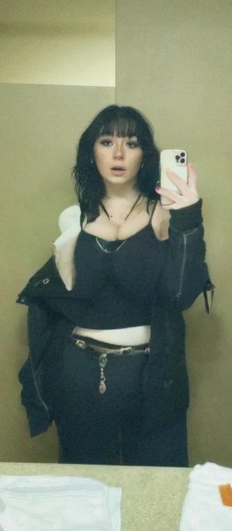arafed woman taking a selfie in a mirror with a cell phone, with pale skin, she looks like a mix of grimes, goth girl aesthetic, 1 7 - year - old goth girl, looks like a mix of grimes, goth aesthetic, pale goth beauty, looks a blend of grimes, very very very pale white skin, resembling a mix of grimes, Big tits, huge tits, no clothes, sexy, cute, wide hips, thick thighs, pear-shaped body, minimal clothes, thick, bbw, chubby stomach, thick nipples, nipple piercings, large areola, hard nipples, piercing through shirt, nipples hard through shirt, busty, major cleavage, naked, ripping through top, boobs spilling over sides, bra too tight, giant tits, dominatrix, dominatrix clothes, revealing clothes, ass so fat you can see it from the front