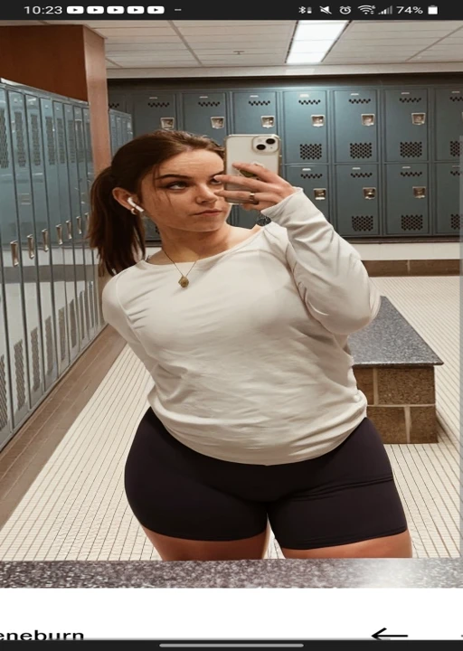 there is a woman taking a selfie in a locker, fit pic, middle body shot, wearing tight shirt, thicc, side pose, in a gym, toned, hand on hips, mid body shot, smoking with squat down pose, tight shirt, upper body shot, working out, casual pose, t pose, arms to side, satisfied pose, strong pose, mirror selfie, beautiful girl, big ass, huge ass, bbw, from behind, thick, thick thighs, wide hips, bbw, big tits, too thick for clothes, huge tits, giant tits, bbw, thick thighs, pear shaped, wide hips, sexy