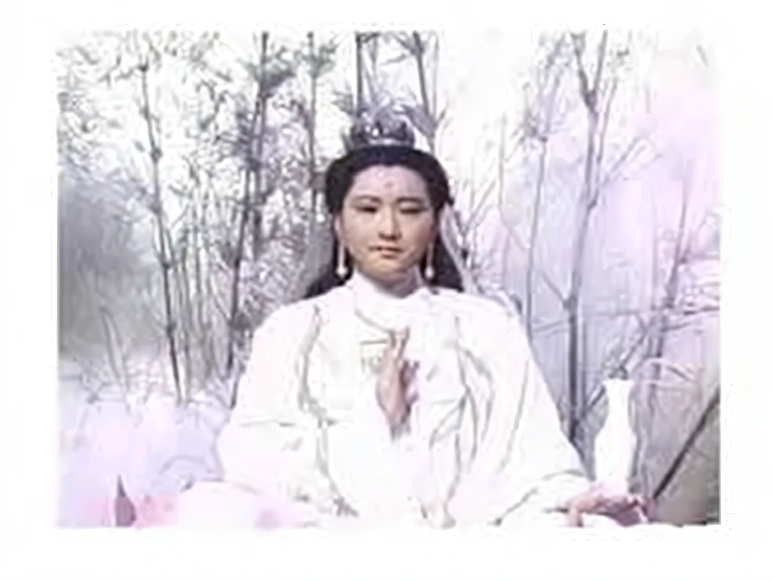 Painting of Guanyin Bodhisattva wearing white clothes sitting on a lotus seat in a bamboo forest,The left hand holds the jade vase,Right hand chanting posture