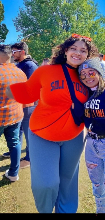 several people are posing for a picture in front of a crowd, profile pic, profile picture, very very low quality picture, having a great time, group photo, with the sun shining on it, hundreds of them, over-shoulder shot, pictured from the shoulders up, karla ortiz, center of picture, wearing an orange t shirt, discovered photo, Big tits, huge tits, no clothes, sexy, cute, minimal clothes, thick, bbw, chubby stomach, thick nipples, nipple piercings, large areola, hard nipples, piercing through shirt, nipples hard through shirt, busty, major cleavage, naked, ripping through top, spilling over sides, bra too tight, giant tits, extra wide hips, upper body zoom in, showing off huge tits, fat stomach, see through top, fat bbw, large areola showing, major cleavage, latina, down to stomach, wide hips, sexy, upper body zoom, thick arm, showing off , top half only, showing only upper, height difference, down to waist, tall and short girls, belly worship,  worship, touching each other sexy, touch other sexy style, tall and short standing next to each other, two thicc girls different heights, no pants, touching , twerk together, height difference