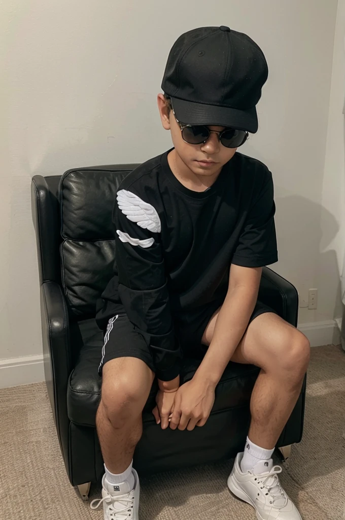 Create a 3D illusion for a WhatsApp profile picture where a boy in a black shirt sits casually on a wingback chair. Wearing sneakers, a black cricket cap, and sunglasses, he looks ahead. The background features “Nanu” in big, capital white fonts on the black wall. There should not be his shadow, and there are wings to make it appear as if he is an angel.