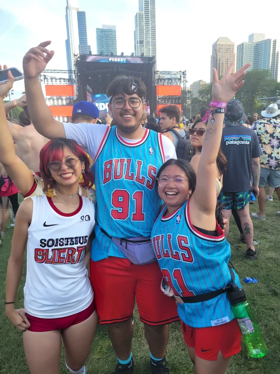 araffes and a couple of people are posing for a picture, wearing nba jersey, live at lollapalooza, music festival, edm fans, wearing basketball jersey, the atmosphere cheerful, festival vibes, photograph of three ravers, having a great time, wearing a volleyball jersey, half man half asian black bull, full costume, wearing authentic attire, jen bartel, Big tits, huge tits, no clothes, sexy, cute, wide hips, thick thighs, pear-shaped body, minimal clothes, thick, bbw, chubby stomach, thick nipples, nipple piercings, large areola, hard nipples, piercing through shirt, nipples hard through shirt, chubby stomach showing, tummy spilling over the side, muffin top, panties only, no pants, pants off, stomach too big for panties, two girls standing next to one man in the middle, 2 girls surrounding 1 man, the girls are sexy, threesome, the girls are short, the girls are very short, upper body zoom, upper body in picture