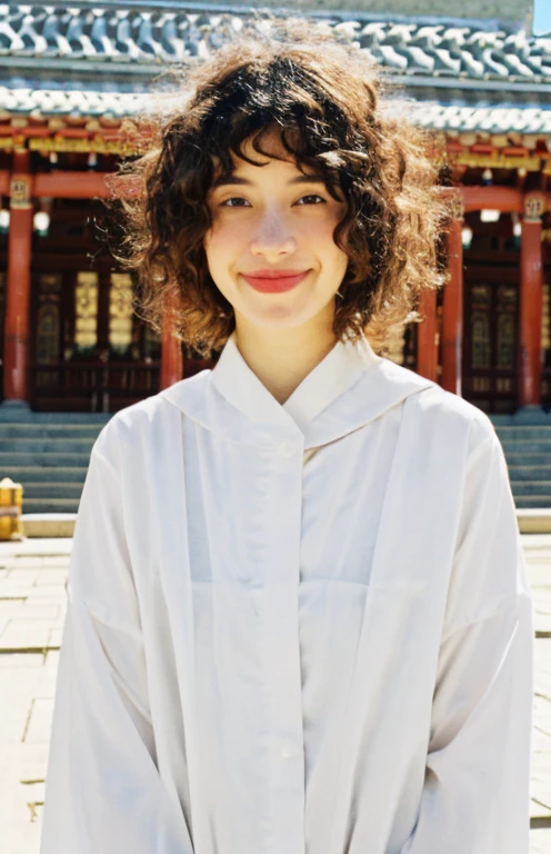 Willow Ryder, masterpiece, best quality, 1girl, smile, lips, brown eyes, brown (curly|messy) hair, closed mouth, looking at viewer, short hair, background: standing infront of a temple solo, upper body, wearing religious attire, 