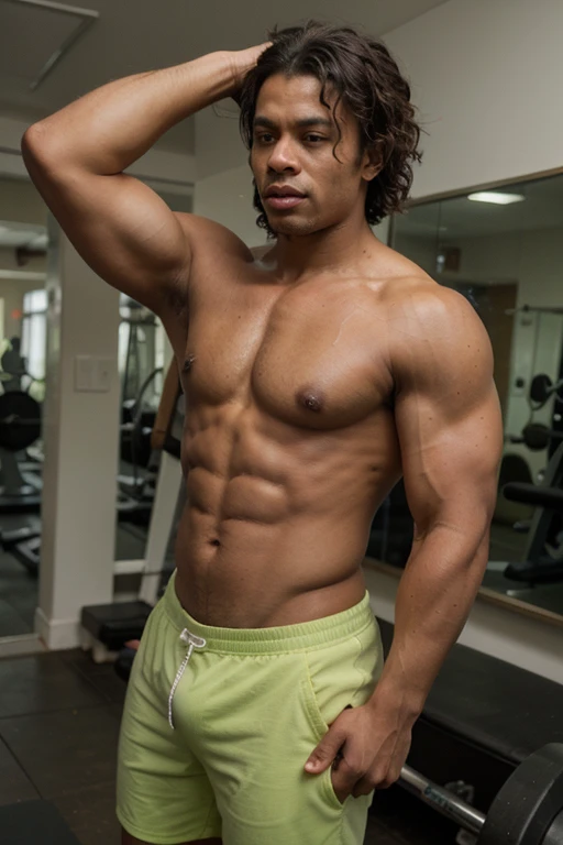 Strong African Mercian with abs strong as the hulk in the gym nice haircut veins on arm, fohawk hair cut, curly hair