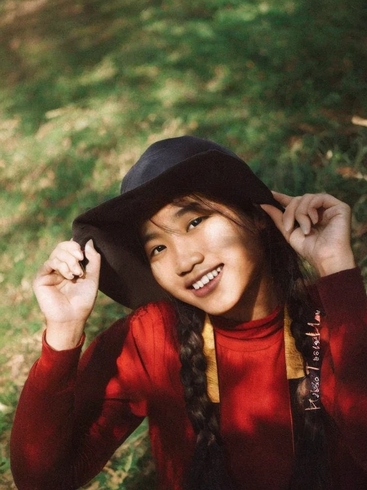 Asian girl,embarrassed,twin braids with black colour,clasp knees,sun light,8k resolution, very realistic,skirt lift,Asian girl,toothy smile,twin braids with black colour,clasp knees,sun light,8k resolution, very realistic,skirt lift,[ good hand,((good hand))4k, high-res, masterpiece,good quality eye, best quality, 1girl, (Burmese Girl),finely detailed skin, sharp focus, (cinematic lighting), collarbone, morning, soft lighting, dynamic angle, [:(detailed face:1.2):0.2], armpit crease, thigh gap, slender, medium breasts, cleavage, full body, (Canon EOS R6, 135mm, 1/1250s, f/2.8, ISO 400:0.9) ]