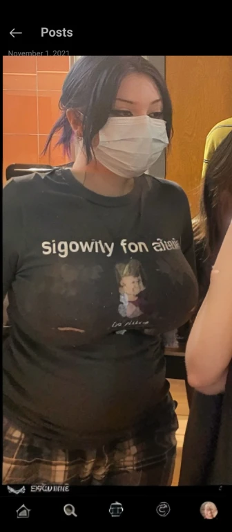 there is a woman wearing a face mask and a shirt, looks like domhnall gleeson, xqc, with the face of emma watson, wearing a t-shirt, very grainy, unknown artist, tommy 1 6 , Big tits, huge tits, no clothes, sexy, cute, wide hips, thick thighs, pear-shaped body, minimal clothes, thick, bbw, chubby stomach, thick nipples, nipple piercings, large areola, hard nipples, piercing through shirt, nipples hard through shirt, busty, major cleavage, naked, ripping through top,  spilling over sides, bra too tight, giant tits, extra wide hips, upper body zoom in