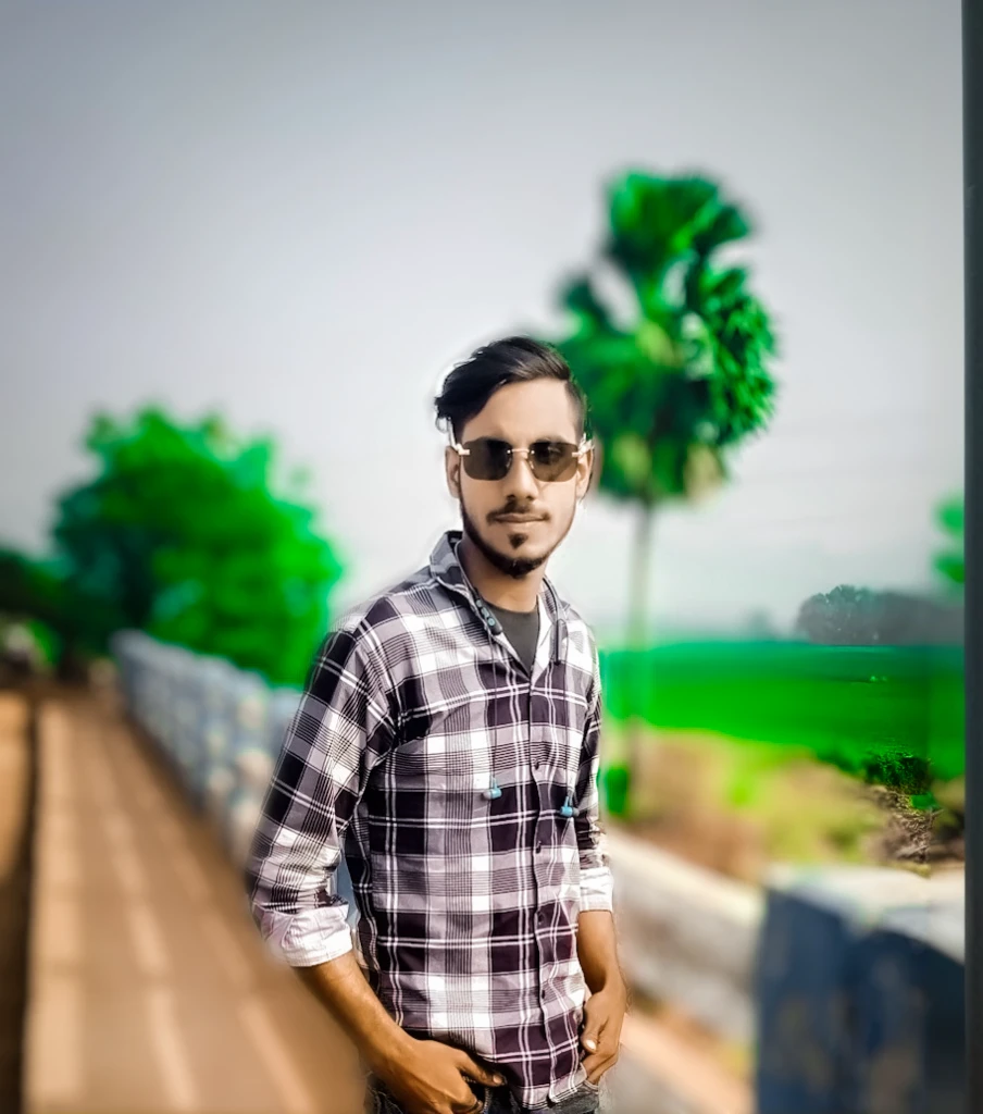 arafed man in plaid shirt and jeans standing on a bridge, casual photography, background blur, hdr photo, shot on nikon z9, photography hight quality, edited in photoshop, with lovely look, made with photoshop, with accurate face, photograpgy, stylish pose, realistic picture, cinematic look, cinematic photo, very very low quality picture