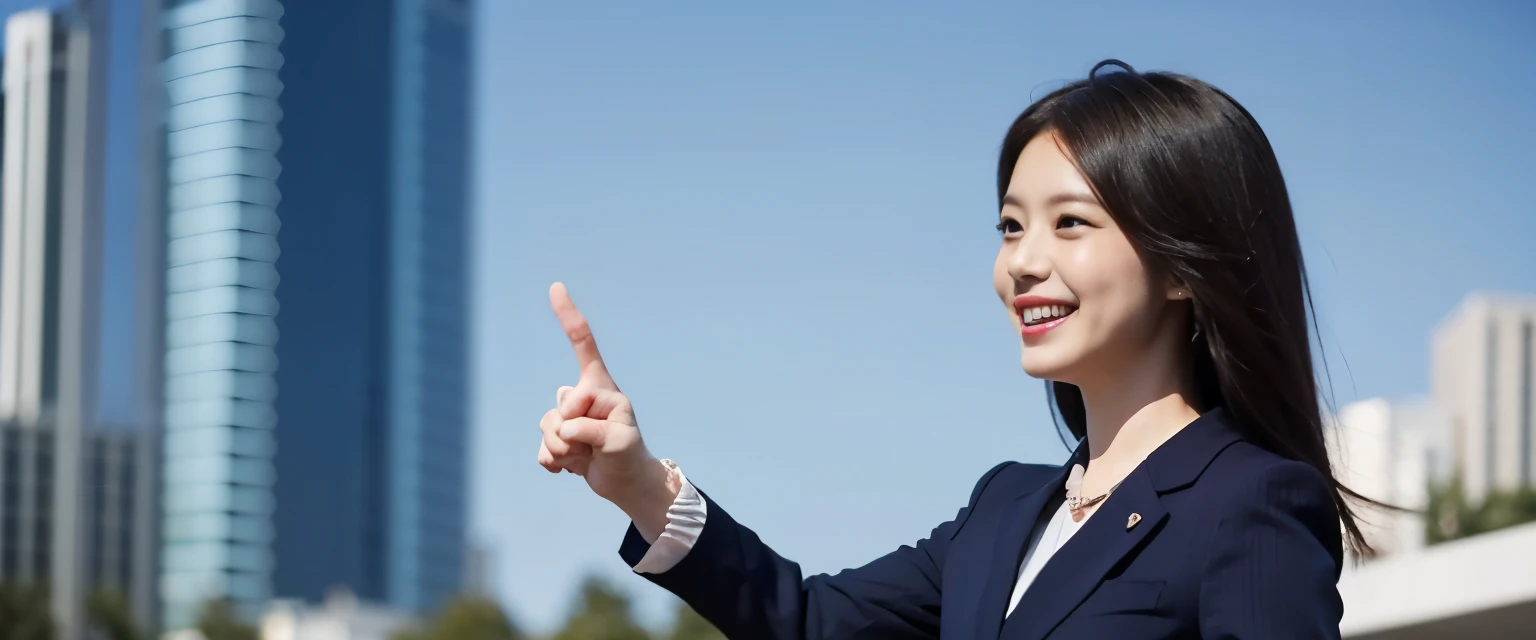 The most beautiful woman pointing diagonally upwards with her index finger outdoors、with shiny brown hair、Wearing a navy suit、very fascinating.。She was excited to join the company and gave a fist pump.、His face is shining with anticipation.。her fashion and expressions、The perfect balance of cuteness and elegance、draw the viewer in、'Don't let go.。The background is blurry。through this scene、express her charm to the fullest。"