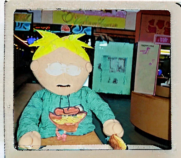 Butters Stotch eating Maple Churros in China Mall on 2044, Creepy Face, Polaroid Camera