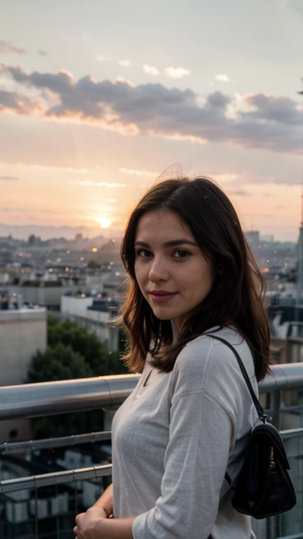 Woman enjoying a sunset in Paris