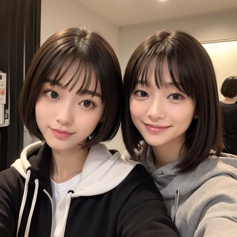 A face like Suzu Hirose、looking at the viewer、smiling、two girls、16 year old girl、wear an oversized hoodie、chest bulge、bob hairstyle、taking a selfie、night、