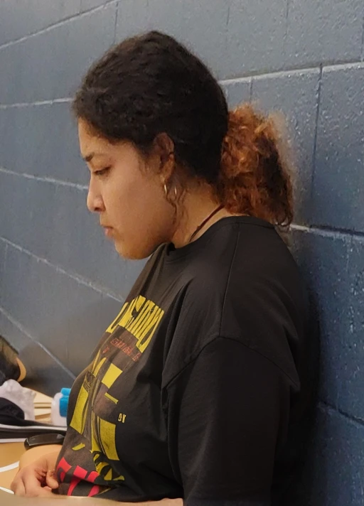there is a woman sitting on a bench using a cell phone, resting after a hard fight, deep in thought, profile shot, candid shot, side profile shot, heavy grainy picture, lost in thought, low quality grainy, pensive, grainy low quality, left profile, looking sad, side profile portrait, looking distracted, student, movie still of a tired, latina, Big tits, huge tits, no clothes, sexy, cute, minimal clothes, thick, thick nipples, nipple piercings, large areola, hard nipples, piercing through shirt, nipples hard through shirt, major cleavage, nipples showing through shirt, giant tits, showing off tits, looking left, facing left, sideboob, side profile
