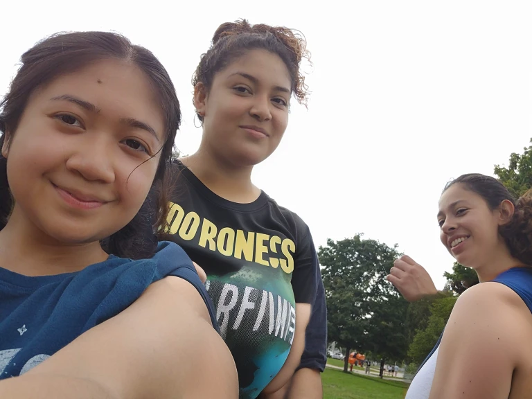 there are three girls standing in a park with one pointing at the camera, park in background, at the park on a beautiful day, at the park, at a park, with wet faces!!, having a great time, not blurry, shot on gopro9, taken on go pro hero8, very very low quality picture, with a park in the background, latina, Big tits, huge tits, no clothes, sexy, cute, minimal clothes, thick, thick nipples, nipple piercings, large areola, hard nipples, piercing through shirt, nipples hard through shirt, major cleavage, nipples showing through shirt, giant tits, cleavage is crazy, showing off tits, showing tits, big tits behind other girl