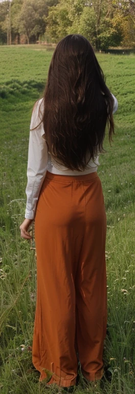 Straigthening the hair of the woman standing in the field. I want her hair very thin and straight. I want straightening totally