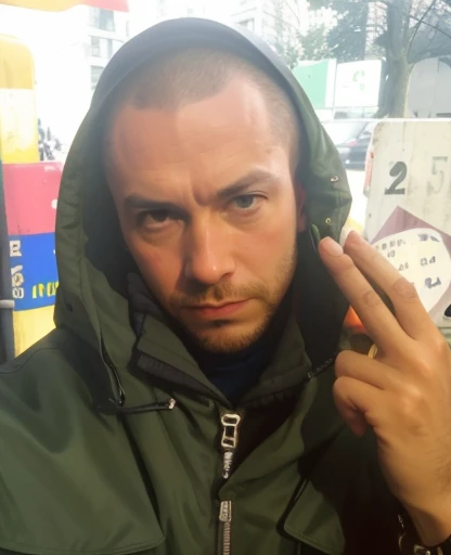 Close up of a face of a man in a green jacket, showing two fingers pretending it's a gun by his head, taxi driver movie color palette, city underground vibe, lost, no future, skinhead, numb eyes, bom, 8k selfie photograph, patryk hardziej, aphex twin, Michael Gira