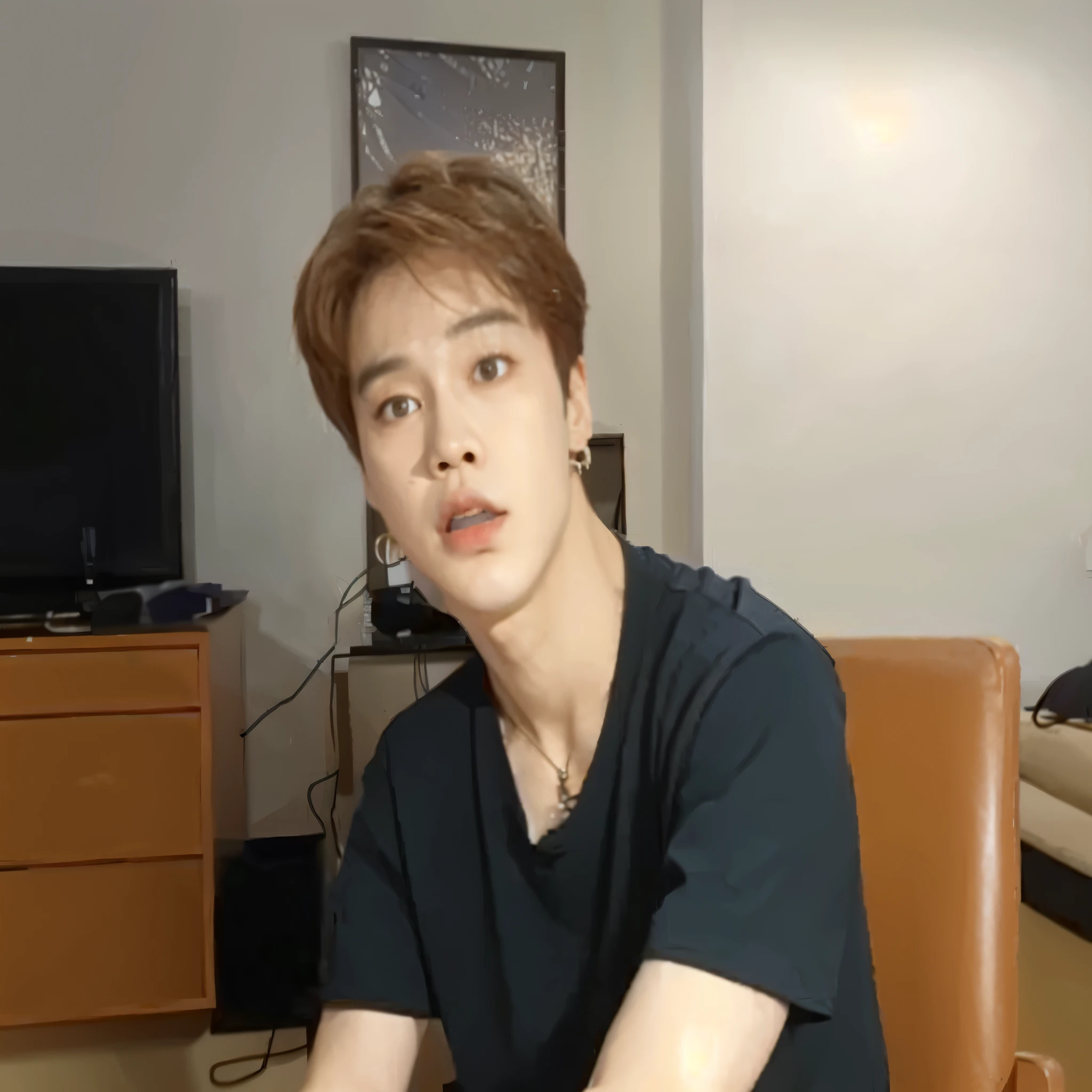 there is a man sitting in a chair with a remote control, Jimin, park Jimin, accurate Jimin face, Jimin\o nariz grego, Jimin\the full lips, Jung Jaehyun, Jimin\the right eyelid is swollen, todos do grupo nct, hyung tae, Hsiao-ron, Yanjun Chengt, cai xukun