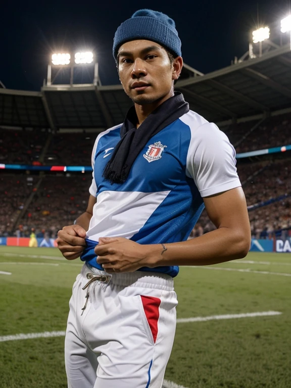 realistic portrait of an Indonesian man wearing a blue hat wearing white jogger pants and a blue t-shirt similar to a football jersey with a picture of a lion below it with the words "SINGO EDAN" on the front of the jersey, the man is holding up a scarf that says "AREMANIA", he is standing wearing sporty shoes in the stadium stands with bright lights, the background shows a football match between Indonesia
national team and
national team, supporters
Australia
both teams are visible
each country's flag
waved