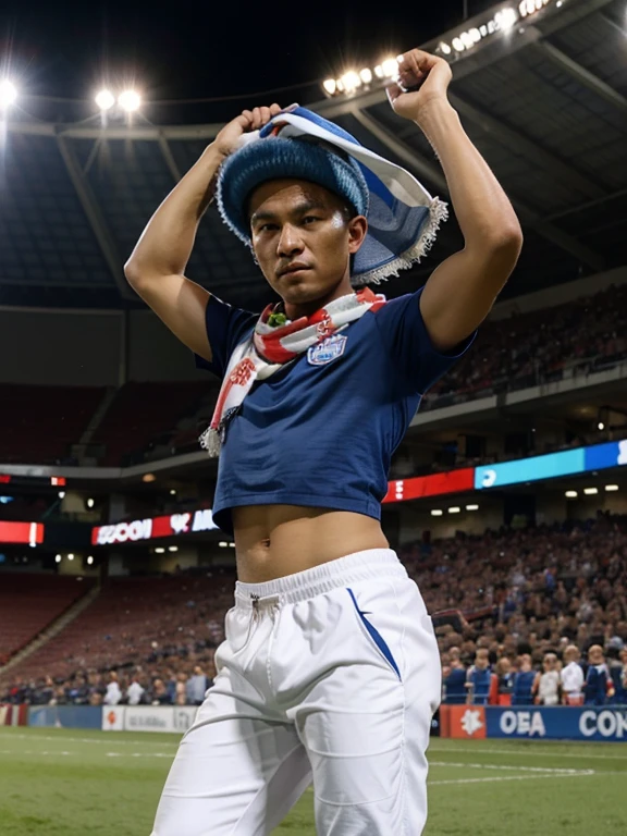 realistic portrait of an Indonesian man wearing a blue hat wearing white jogger pants and a blue t-shirt similar to a football jersey with a picture of a lion below it with the words "SINGO EDAN" on the front of the jersey, the man is holding up a scarf that says "AREMANIA", he is standing wearing sporty shoes in the stadium stands with bright lights, the background shows a football match between Indonesia
national team and
national team, supporters
Australia
both teams are visible
each country's flag
waved