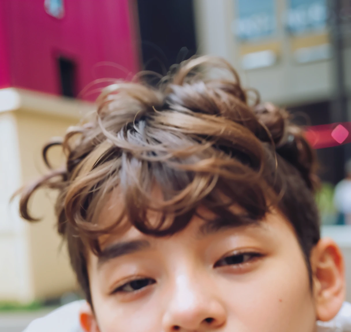 Boy with curly hair