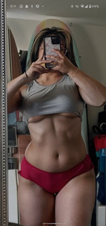 arafed woman in a red bikini taking a selfie in a mirror, half body cropping, fit pic, physical : tinyest midriff ever, tinyest midriff ever, belly exposed, [ adamantly defined abs ]!!, [ rigidly defined abs ]!!, flat chested, middle body shot, leaked photo, Big tits, huge tits, no clothes, sexy, cute, minimal clothes, thick, thick nipples, nipple piercings, large areola, hard nipples, piercing through shirt, nipples hard through shirt, busty, major cleavage, naked, ripping through top, spilling over sides, bra too tight, giant tits, extra wide hips, upper body zoom in, showing off huge tits, see through top, large areola showing, wide hips, thick hips