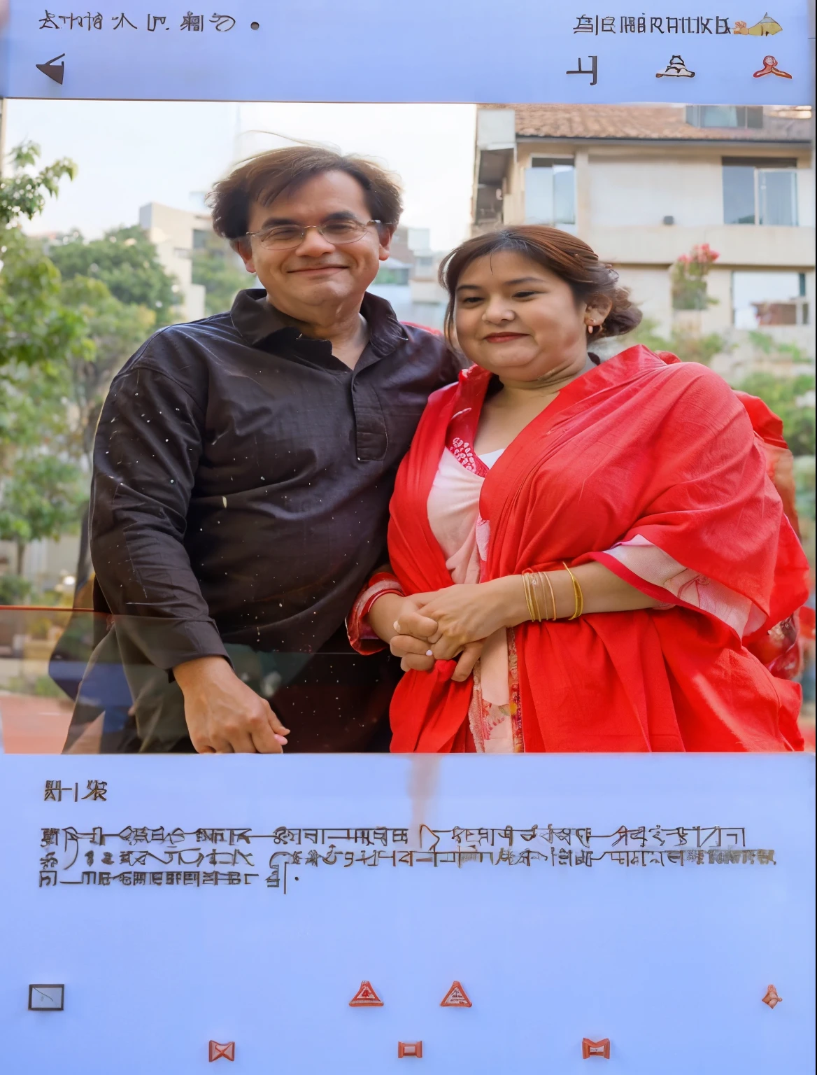 a wearing a red shirt standing next to a woman in a pink sari, lovely couple, momma and papa, happy couple, photo taken in 2 0 2 0, couple pose, real picture, very very low quality picture, candid picture, couple, very clear picture, thought provoking, with village, husband wife and son, photo taken with nikon d 7 5 0,sea beach in backround