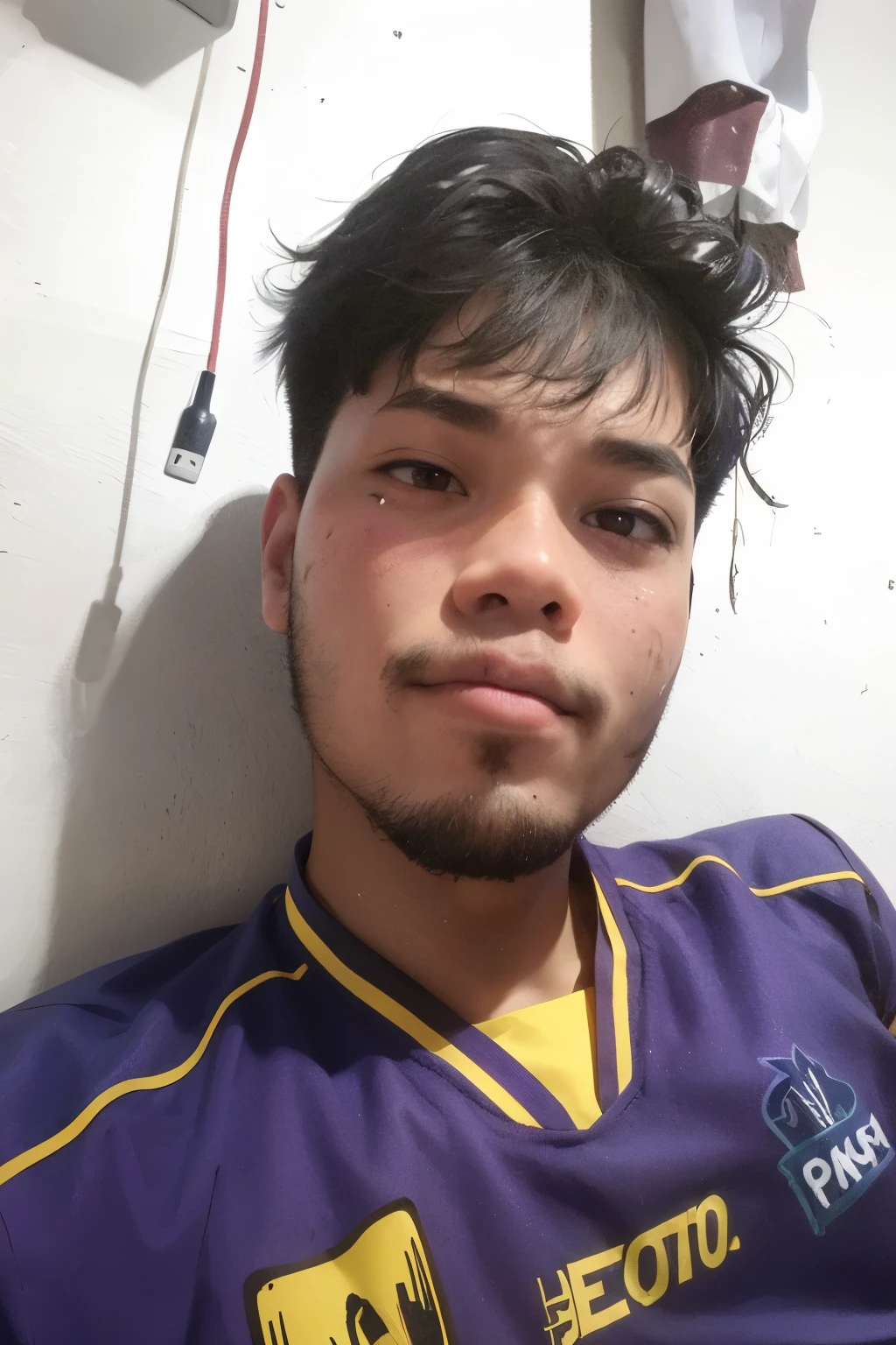 there is a man with a messy haircut and a purple shirt, real ungine, with accurate face, mildly scarred on his face, 2 7 years old, ramil sunga, 2 3 years old, deformed face, face picture, very ugly face, 8k selfie photograph, ayan nag, 2 2 years old, very very low quality picture, face shot