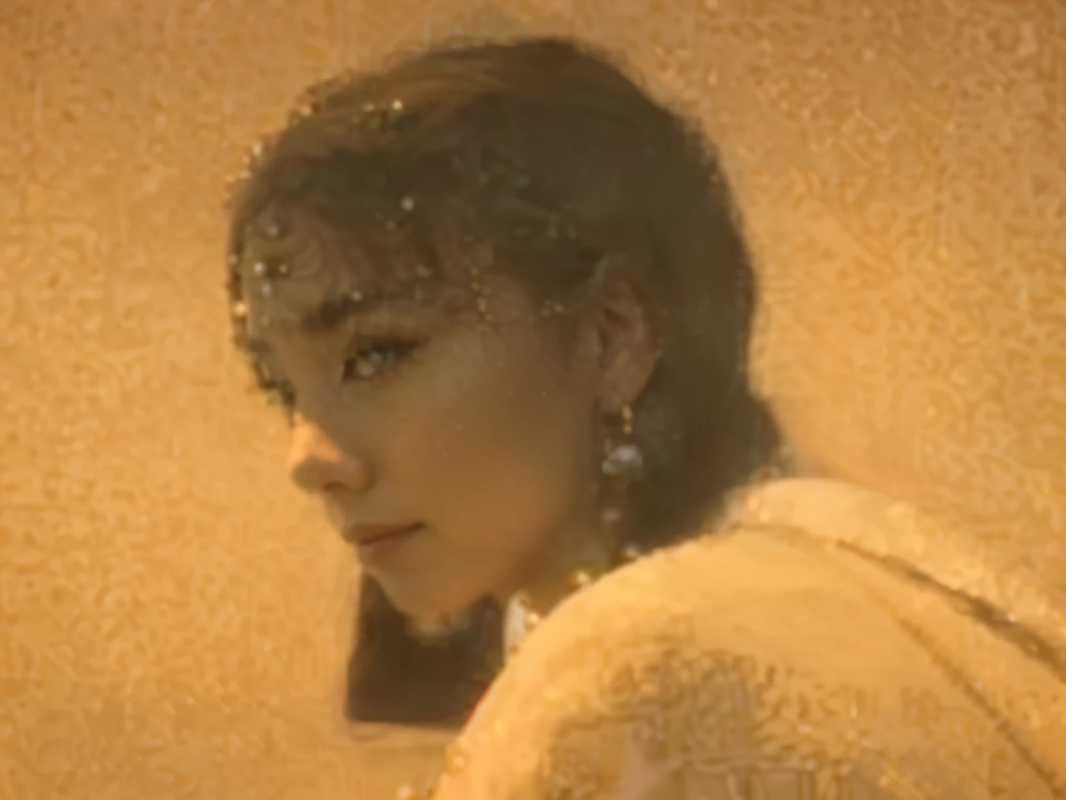 ((beautiful:1.5),high resolution, top quality), profile of a gender-ambiguous Chinese woman wearing gold embroidered (headwrap) inlaid with stones, (sharp eyeliner), earrings, pearl necklace, big bright eyes, dark and vibrant curled hair, slight smile, rosy cheeks, soft light, pure white background.  