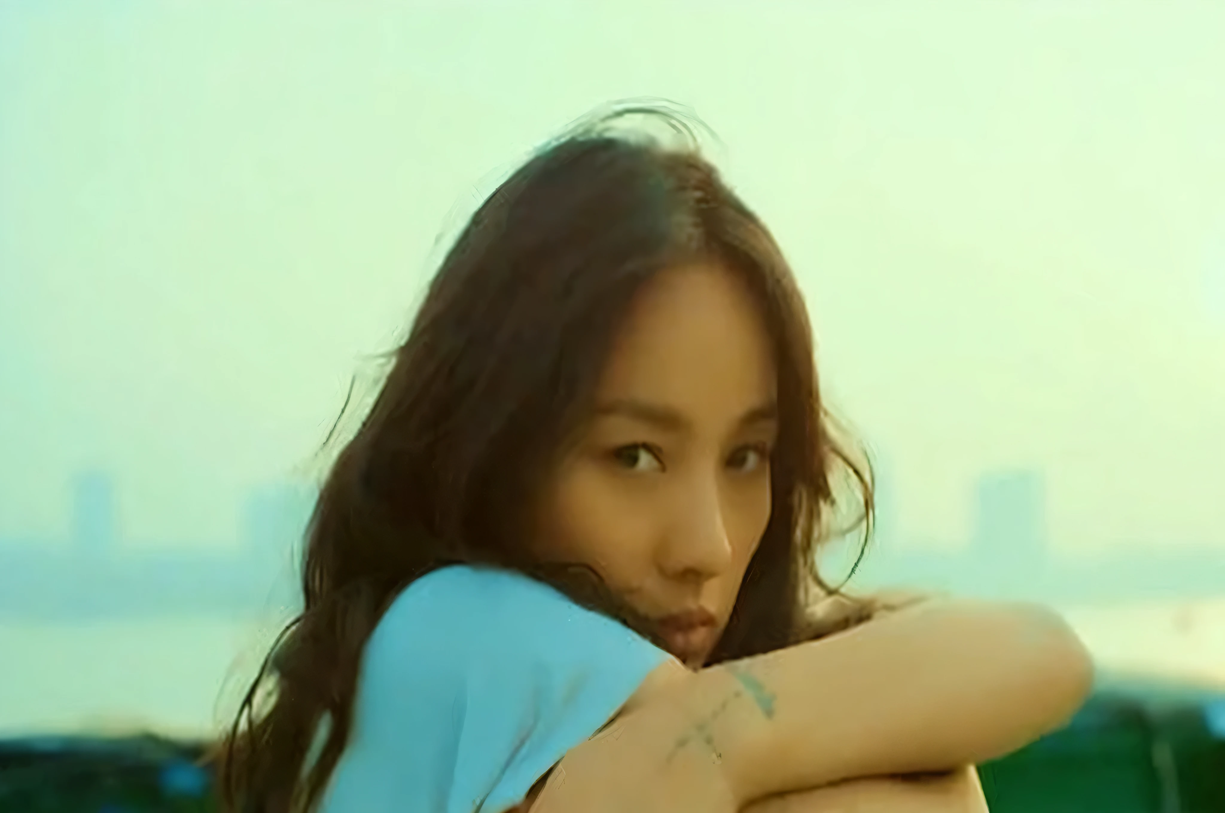A raped woman with long hair and tattoos sits on a bench., krystal, Zia, Music Video, blackpink jennie, Jiyoon Chae, Gemma Chen, shaxi, at the beach, common ratio, Queen of the Sea Mu Yanling, Taejun Kim, still from a Music Video, choi, make, choi헌화, sonyoonjoo