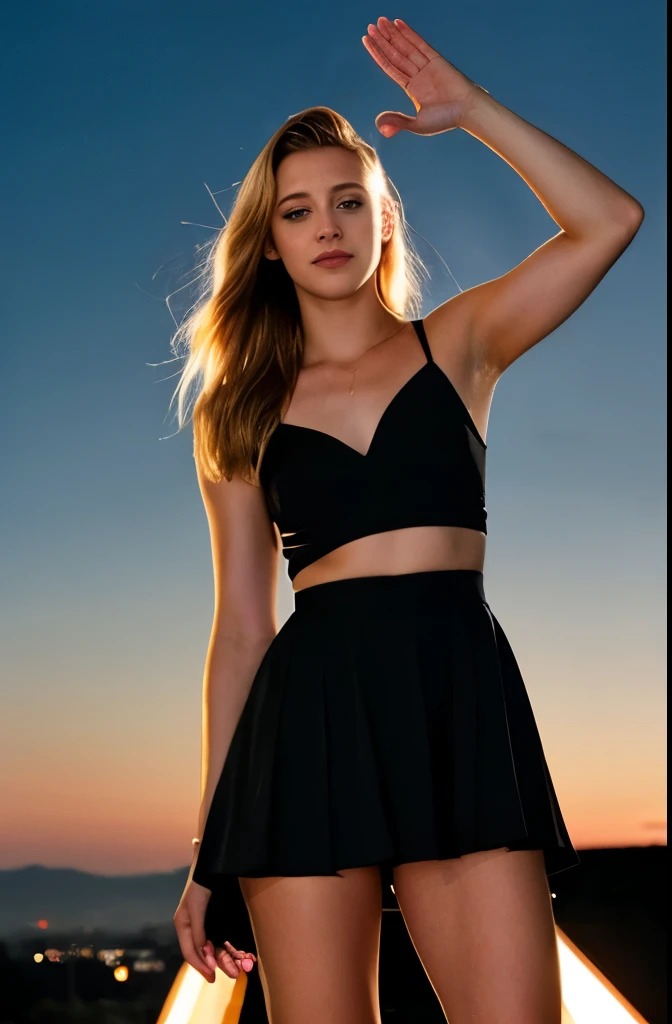 blonde Lili Reinhart in a dark theme waving goodbye