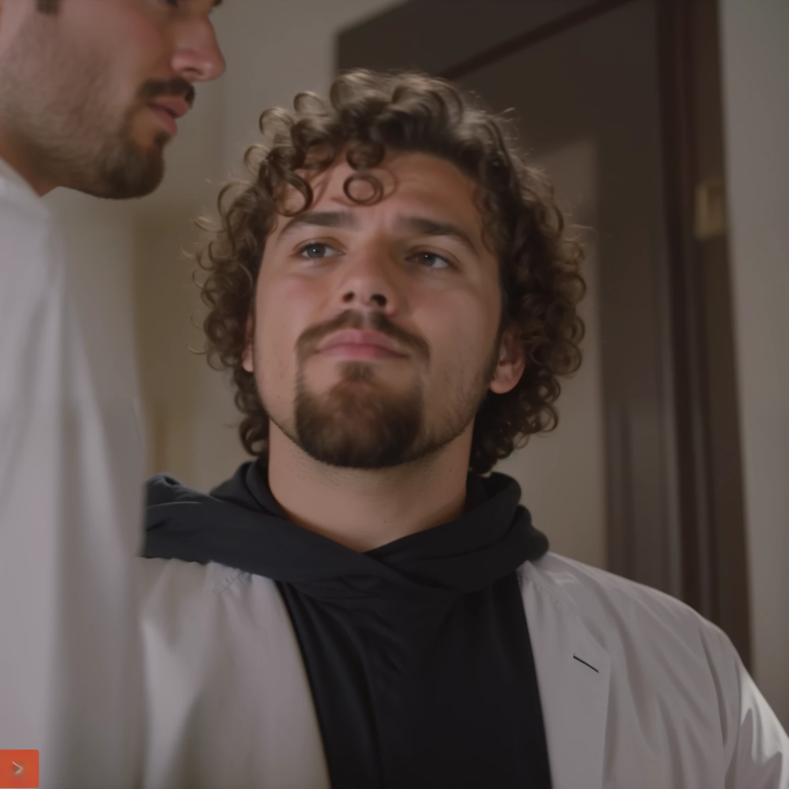 Hay un hombre con barba y una chaqueta puesta., Dream, he has short curly brown hair, frame from a music video, rizos en la parte superior de su cabeza, still from a movie, still from movie, mirando a su lado, still from a movie de acción real, Still frame of a movie, screenshot from a movie