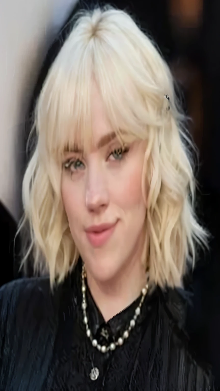 arafed blond woman with a black shirt and pearls on her neck, short blonde hair with bangs, with short hair with bangs, white fringy hair, short wavy blond hair, central parted fringe, white bangs, blonde shaggy hair, emma stone with blond hair, billie eilish, pale skin curly blond hair, she has blond hair, center parted bangs, big