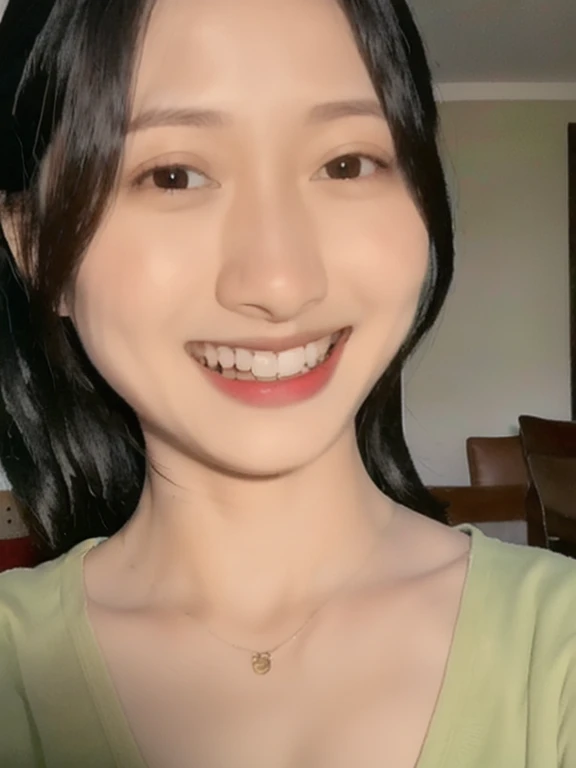 A close up of a woman with a green shirt smiling - SeaArt AI
