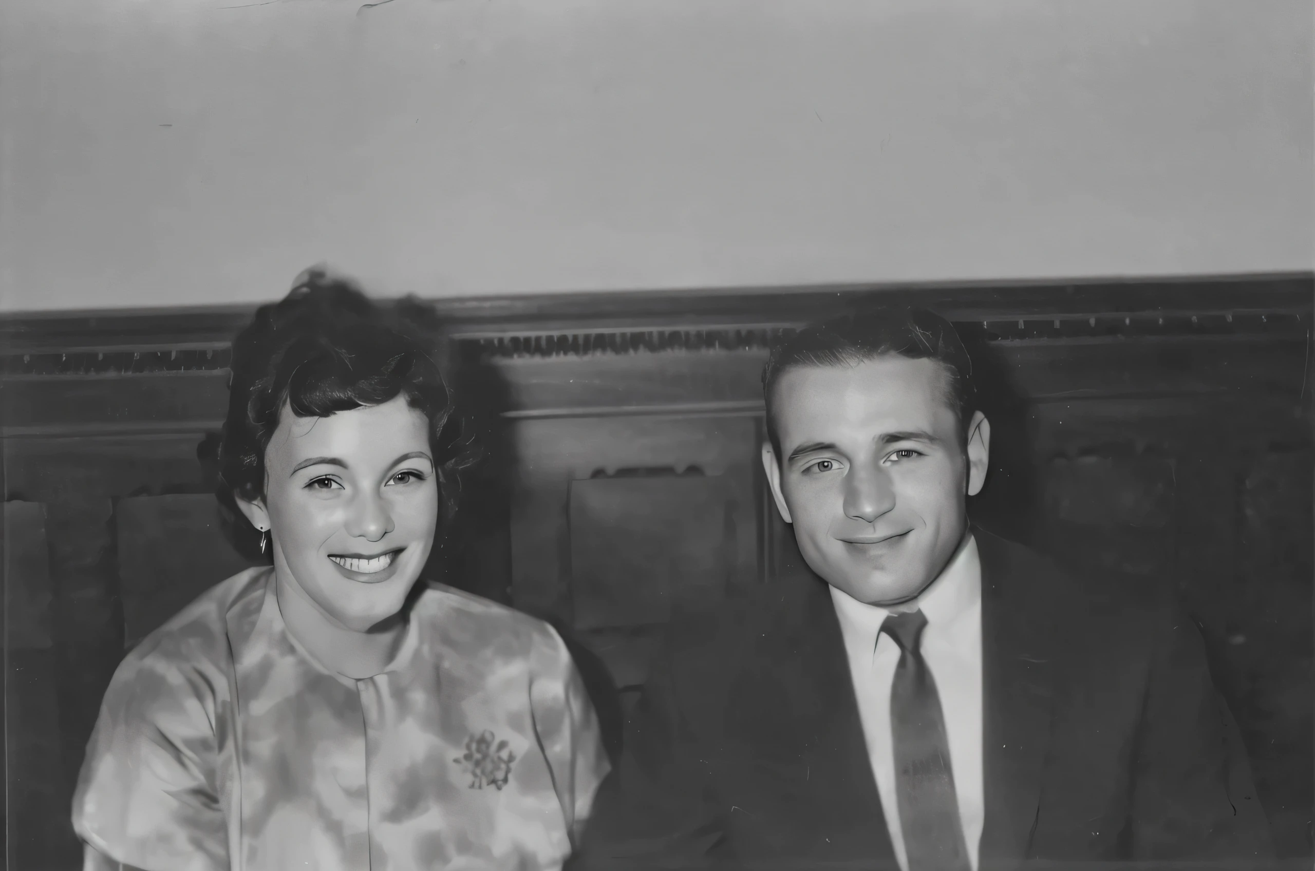 arafed black and white photo of a man and woman sitting at a table, taken in the early 1960s, 1950s photograph, photo 1960, early black and white photo, smile 1950s, archived photograph, portrait of two people, an old balck and white photo