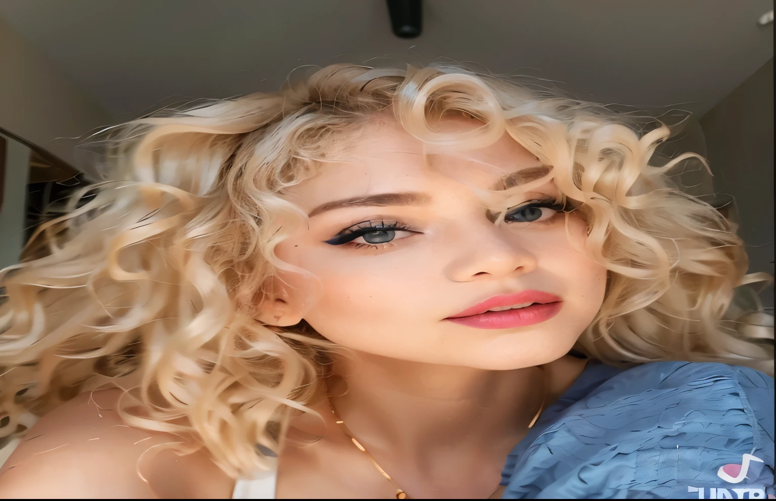 a close up of a woman with blonde hair and a blue shirt, pale skin curly blond hair, curly blonde hair | d & d, popular south korean makeup, blonde curly hair, popular korean makeup, blond curly hair, curly bangs, long fluffy blond curly hair, curly blonde hair, curly blond hair, short curly blonde haired girl, long fluffy curly blond hair