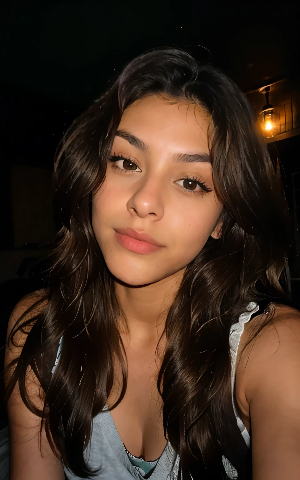 2 mexican girl, Long Wavy Hair, dark brown eyes, eighteen, self portraight pov, taking normal snapchat selfie in dark room (indoors) while laying down in bed