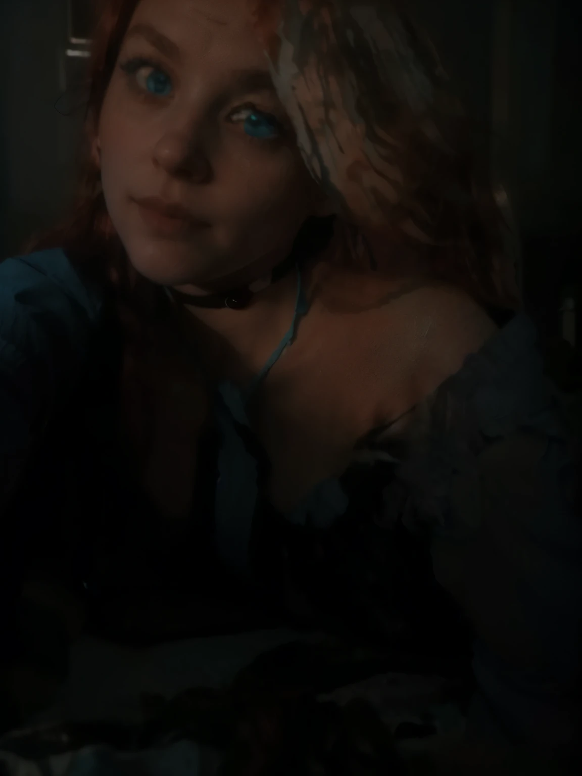 A (((handheld portrait shot))) of a cute girl in her early 20s laying on her back in bed. She has (((shoulder length, wavy, messy red hair,))) and (((icy blue eyes.))) She's wearing a (((pastel blue shirt))) and a (((black choker))). The perspective of the image should be like a (((selfie))) being taken by the woman in her (((bedroom))) with (((very dark lighting)))