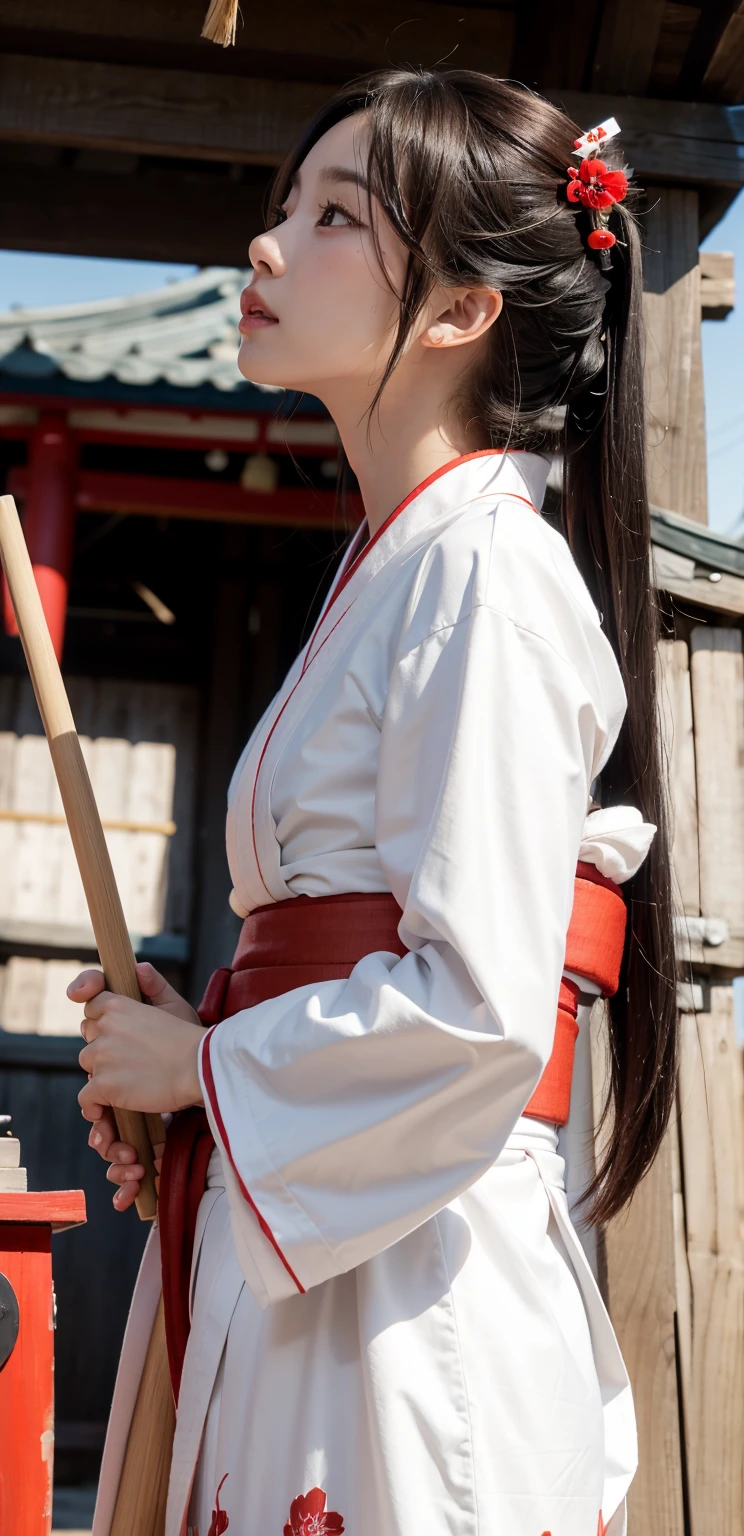 {{there is one standing woman in shrine}},masterpiece,8K,(photo realistic),realistic skin,(very long hair),blush,(shrine maiden,top is (white) yukata,bottom is (red) hakama:1.5), little smile,correct_anatomy,full body,(grabbing broom with both hands:1.3),sun lighting,dramatic lighting,(look up :1.4),45 angle view,35mm lens,(from below:1.4)(natural lighting),lighting her face