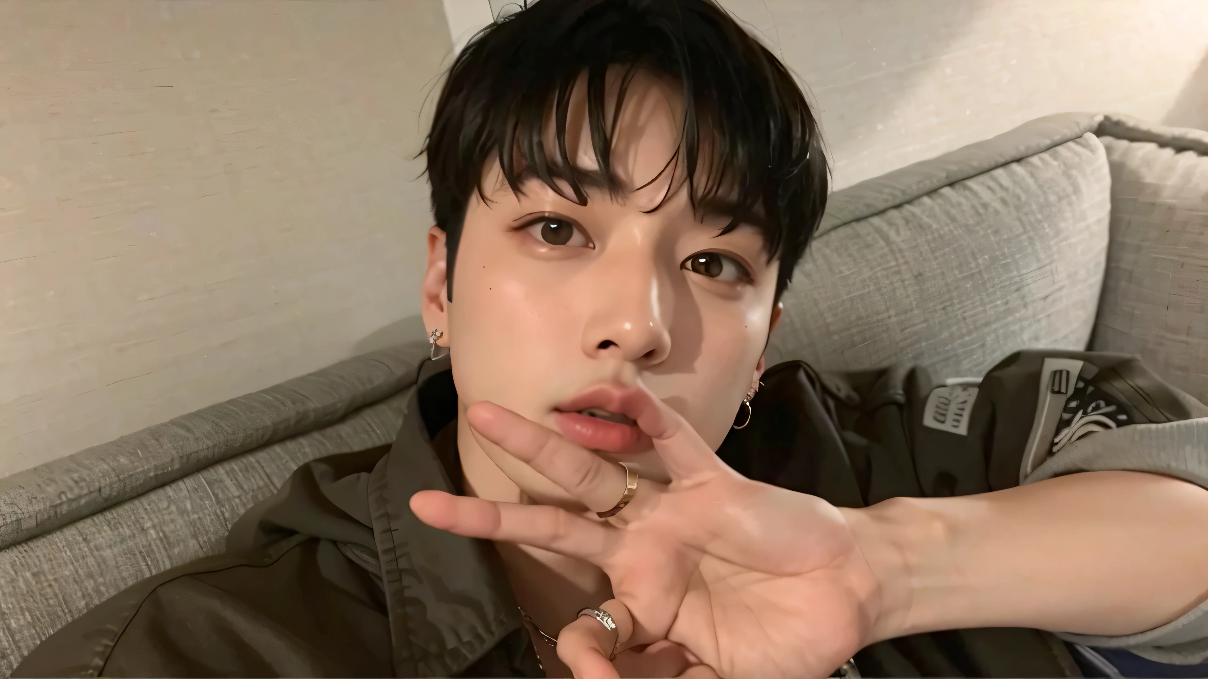 There is a man with a heart-shaped Pandora ring on his finger making a stop sign, jungkook, cai xukun, hyung tae, brillante por la lluvia, with the index finger, inspirado en Kun Can, jinyoung shin, Jimin\his right eyelid is swollen, taken in the early 2020s, foto de perfil, Jimin\los labios carnosos, mejor artista, diez lee