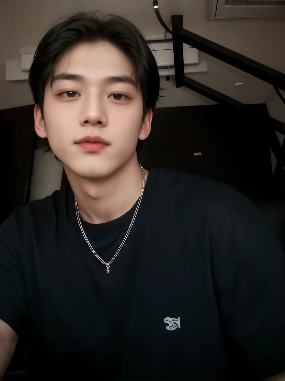 There is a man who is sitting with a cell phone, Taehyung, pale korean adorable face, kim Taehyung, Tae, hombre surcoreano, he wears a black t-shirt, hyung tae, he is about 2 0 years old, he is about 20 years old