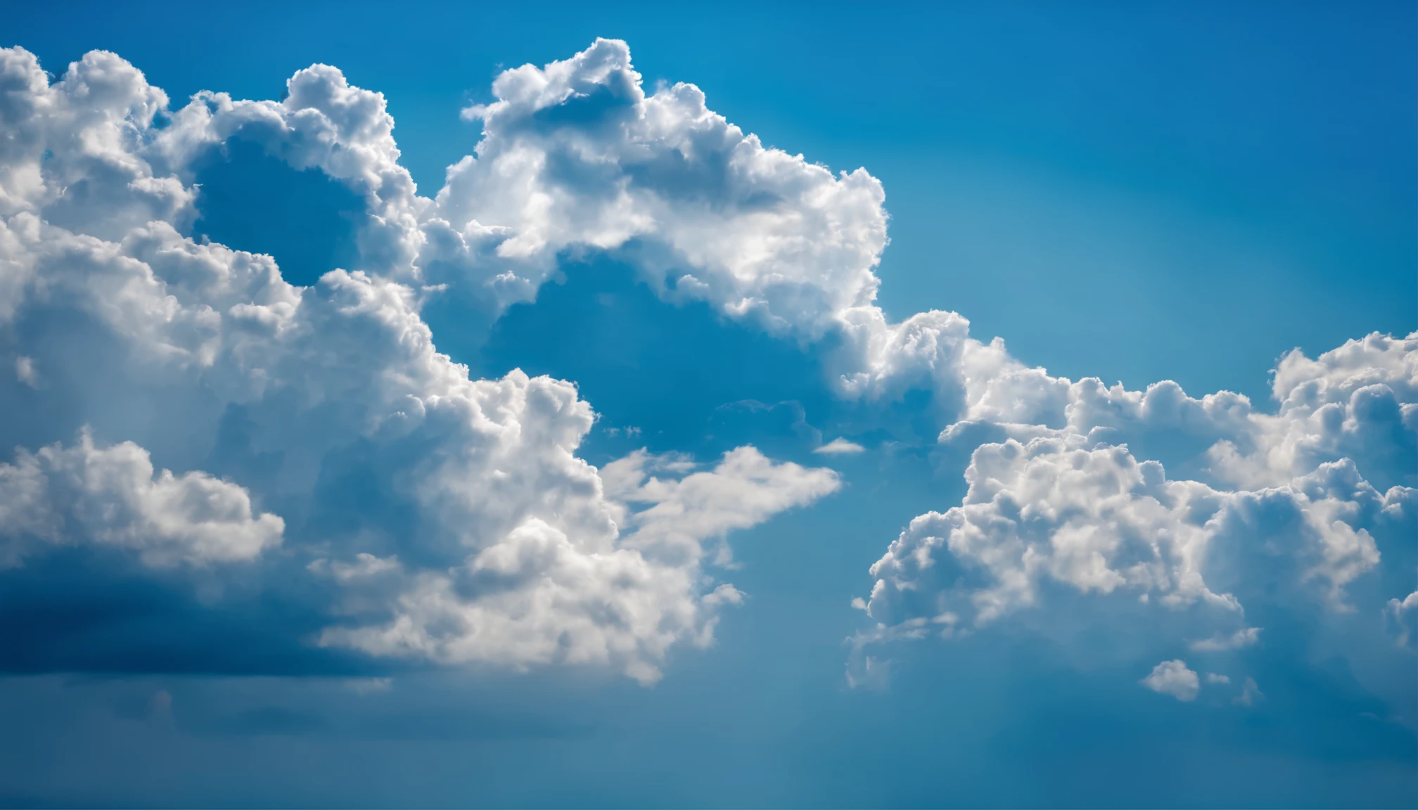 white clouds in a blue sky
