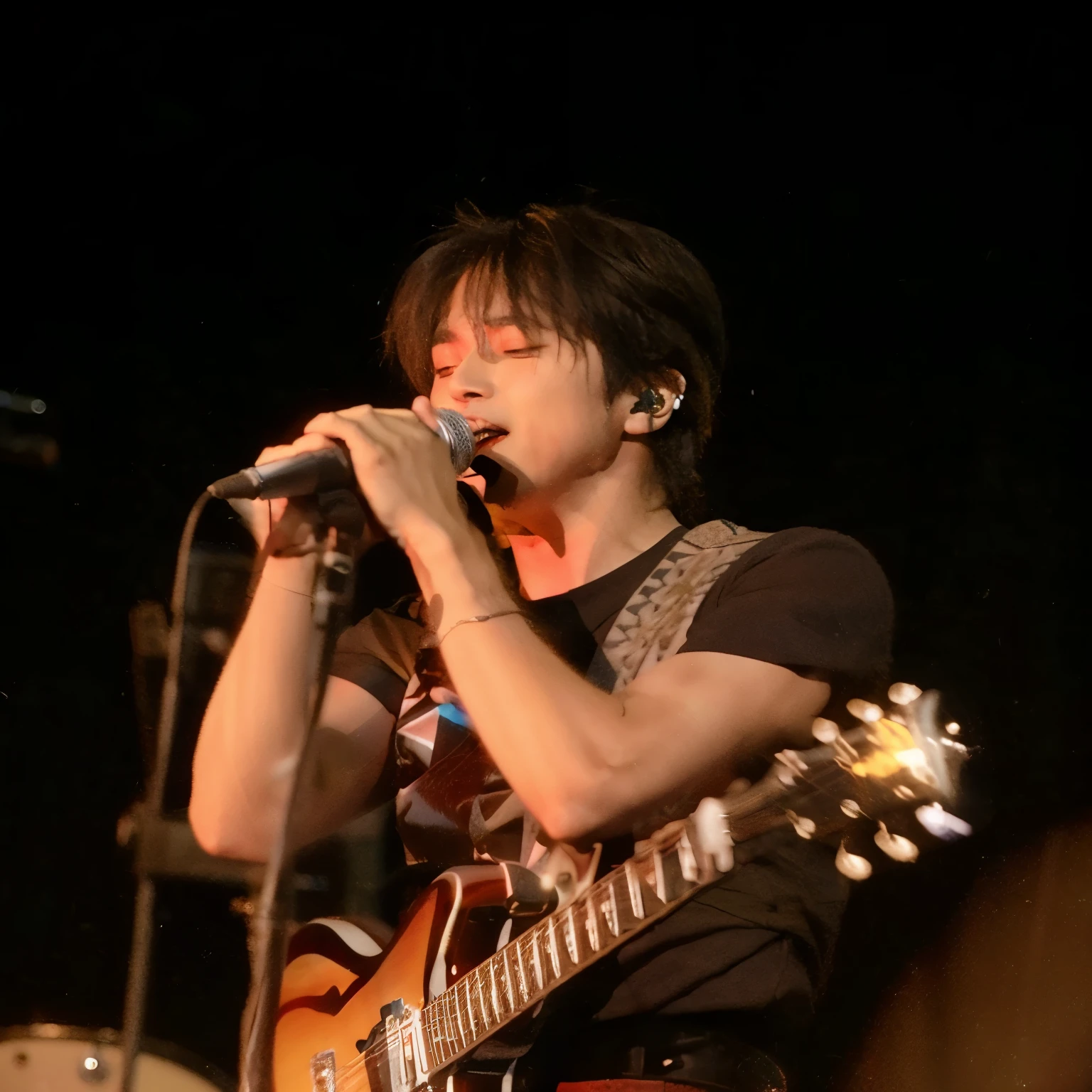 arafed man singing into a microphone while holding a guitar, performing on stage, performing, on stage, playing guitar onstage, taken in the early 2020s, concert photo, on the stage, profile shot, on a stage, lee know