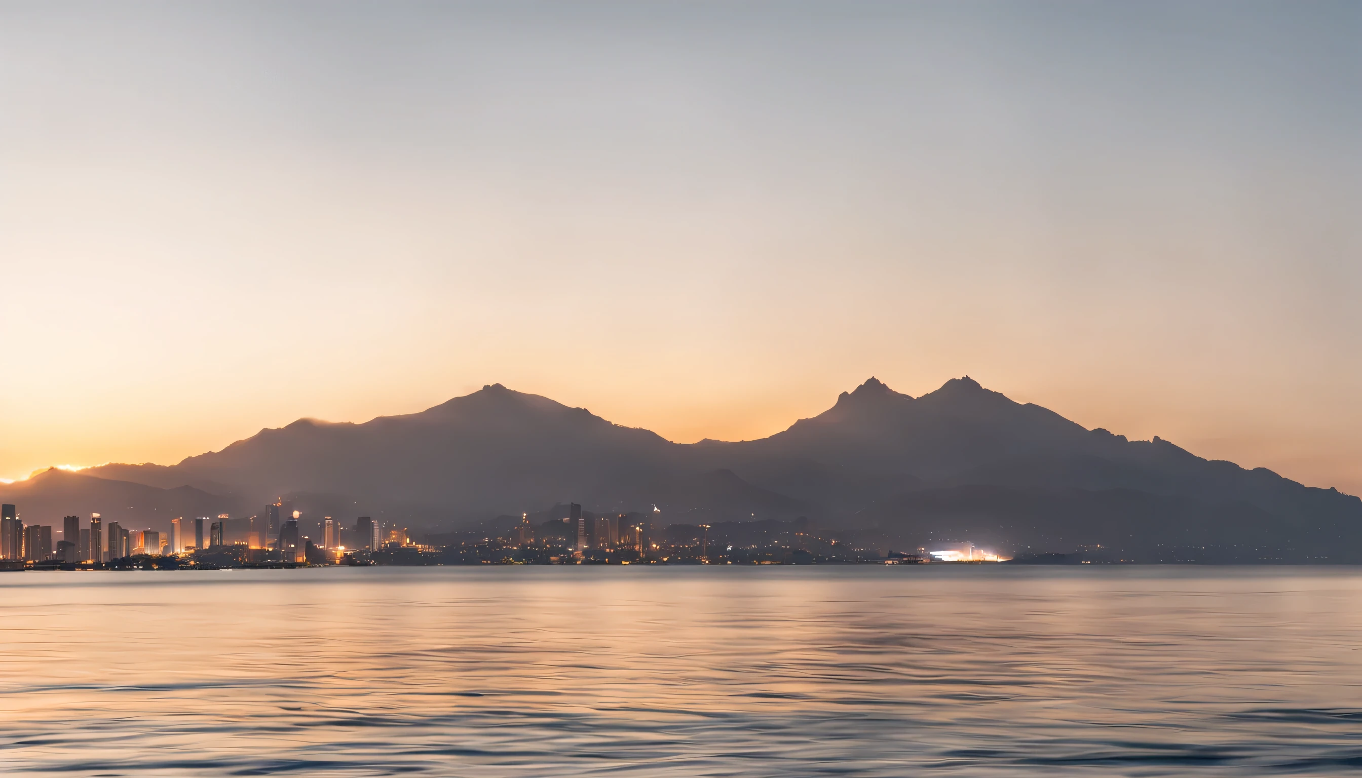 urban area with city lights on, a mountain visible from a distance, with a rising sun, and an ocean