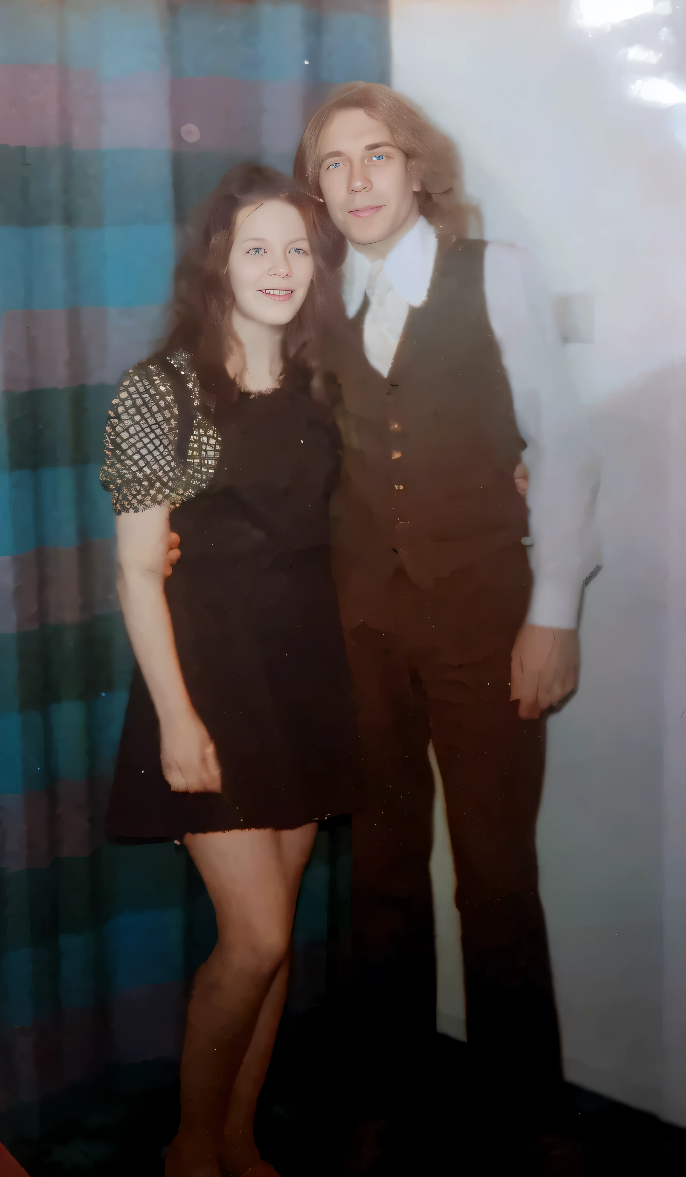 there are two people standing next to each other in a room, taken in the 1970s, photo from the 70s, photo from the 7 0 s, 7 0 s photo, 70s photo, taken in the late 1970s, taken in the early 1970s, late 1 9 6 0's