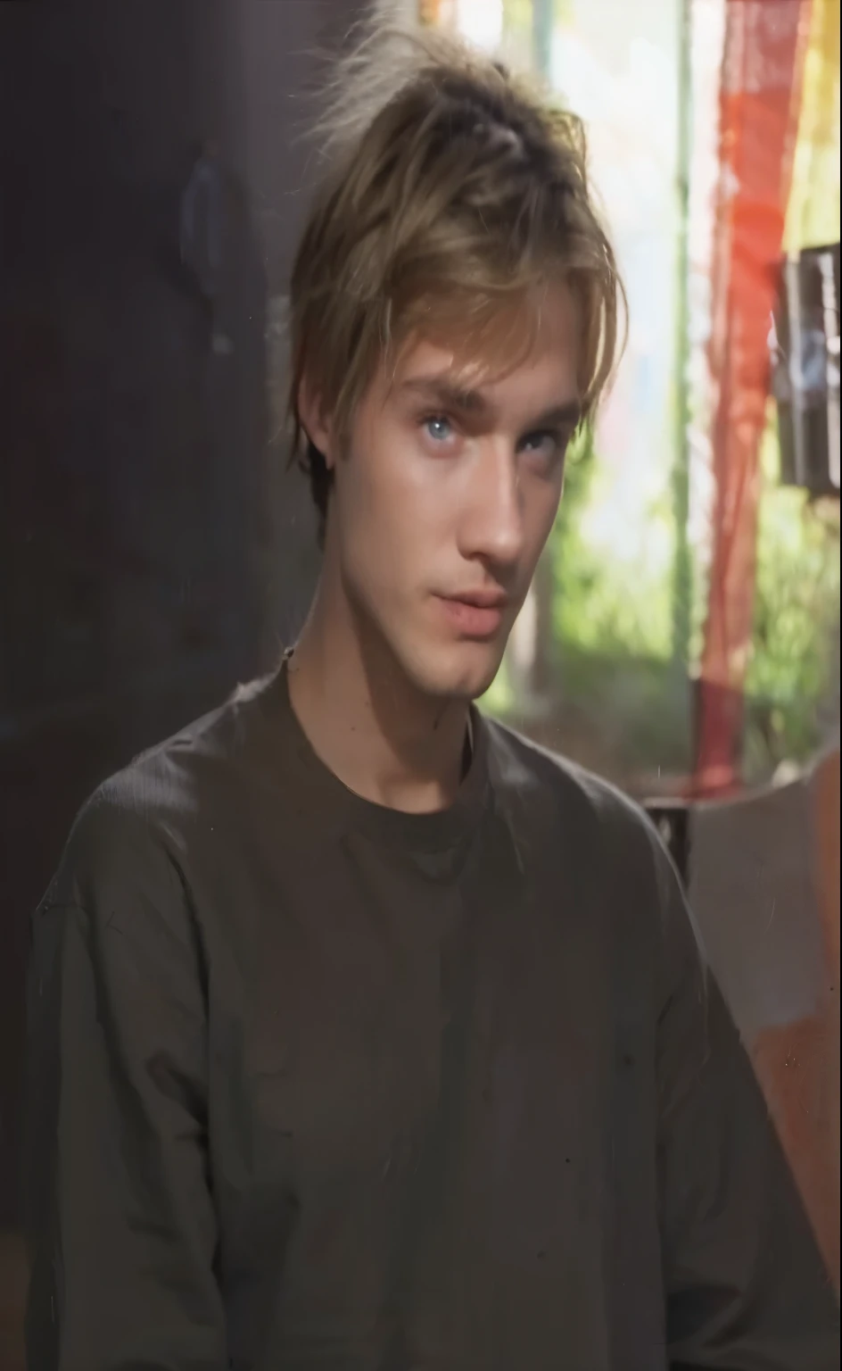 Photography of a 20 year old handsome guy with bleached blond mullet hair cut and dark roots